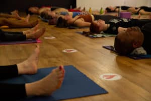 people relaxing at a yoga studio bristol