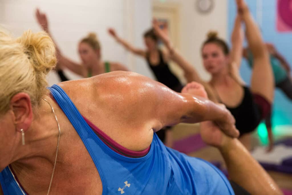 picture of a woman shoulder whilst she is practicing Yoga in a yoga class in bristol